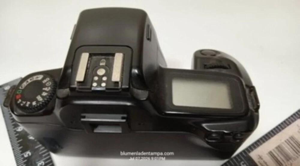 Canon EOS 1000F N 35mm SLR film camera body in black.